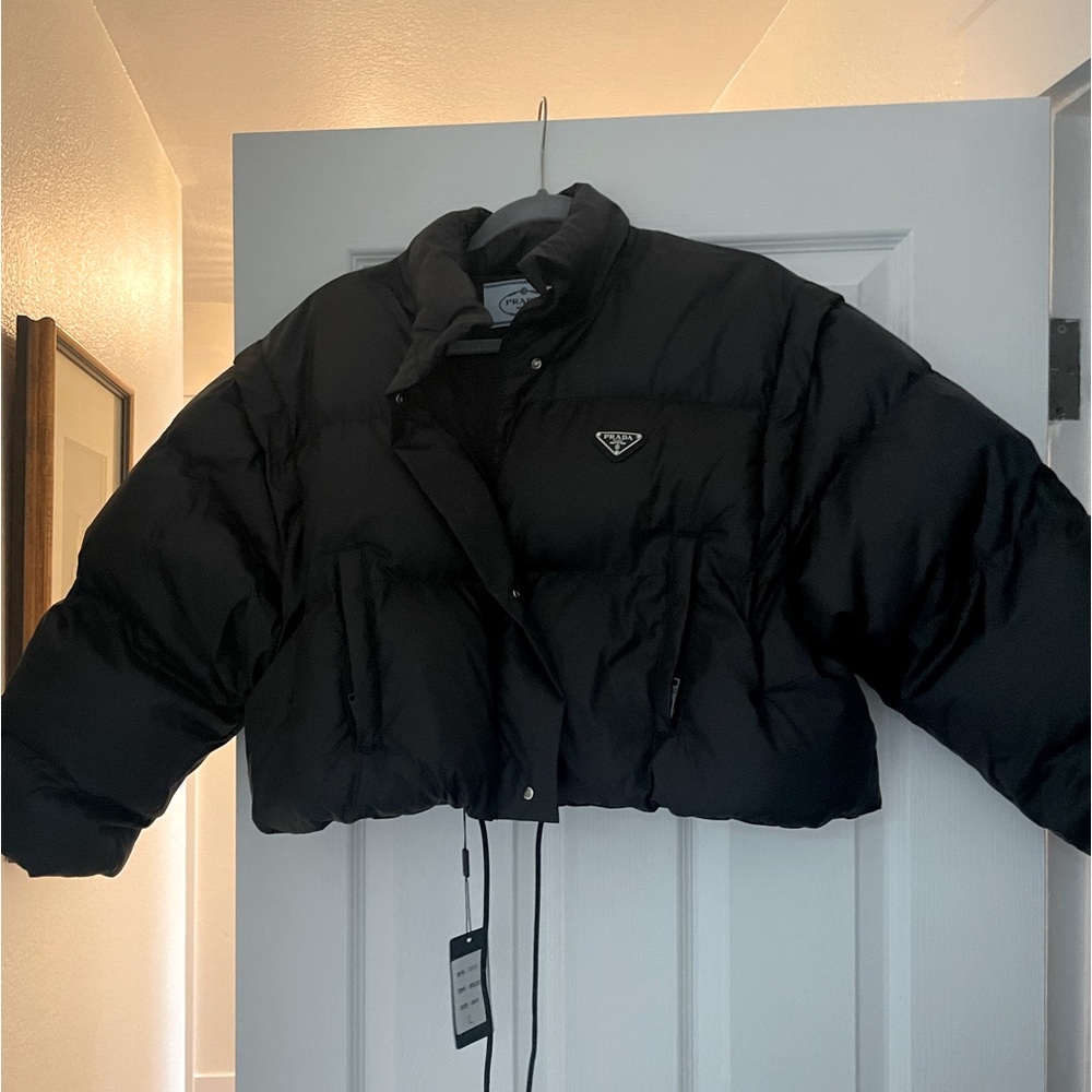 New with tags black crop puff jacket. Size L